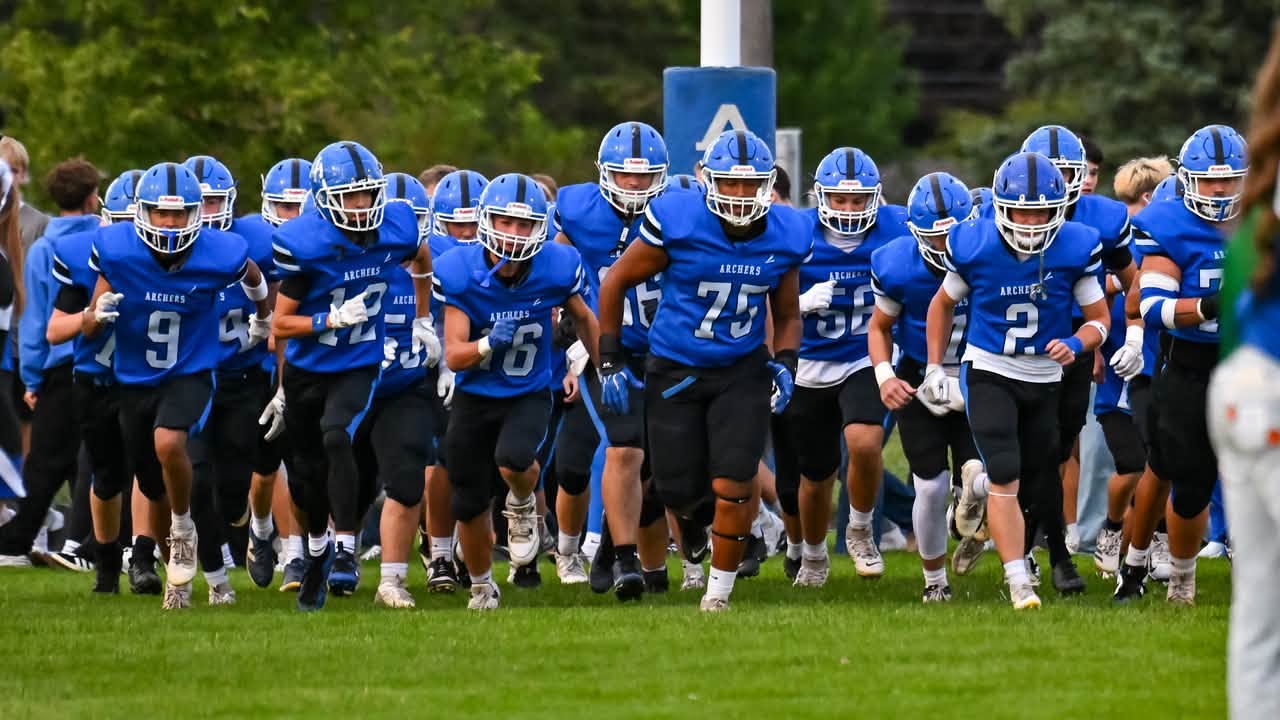 Team running onto field